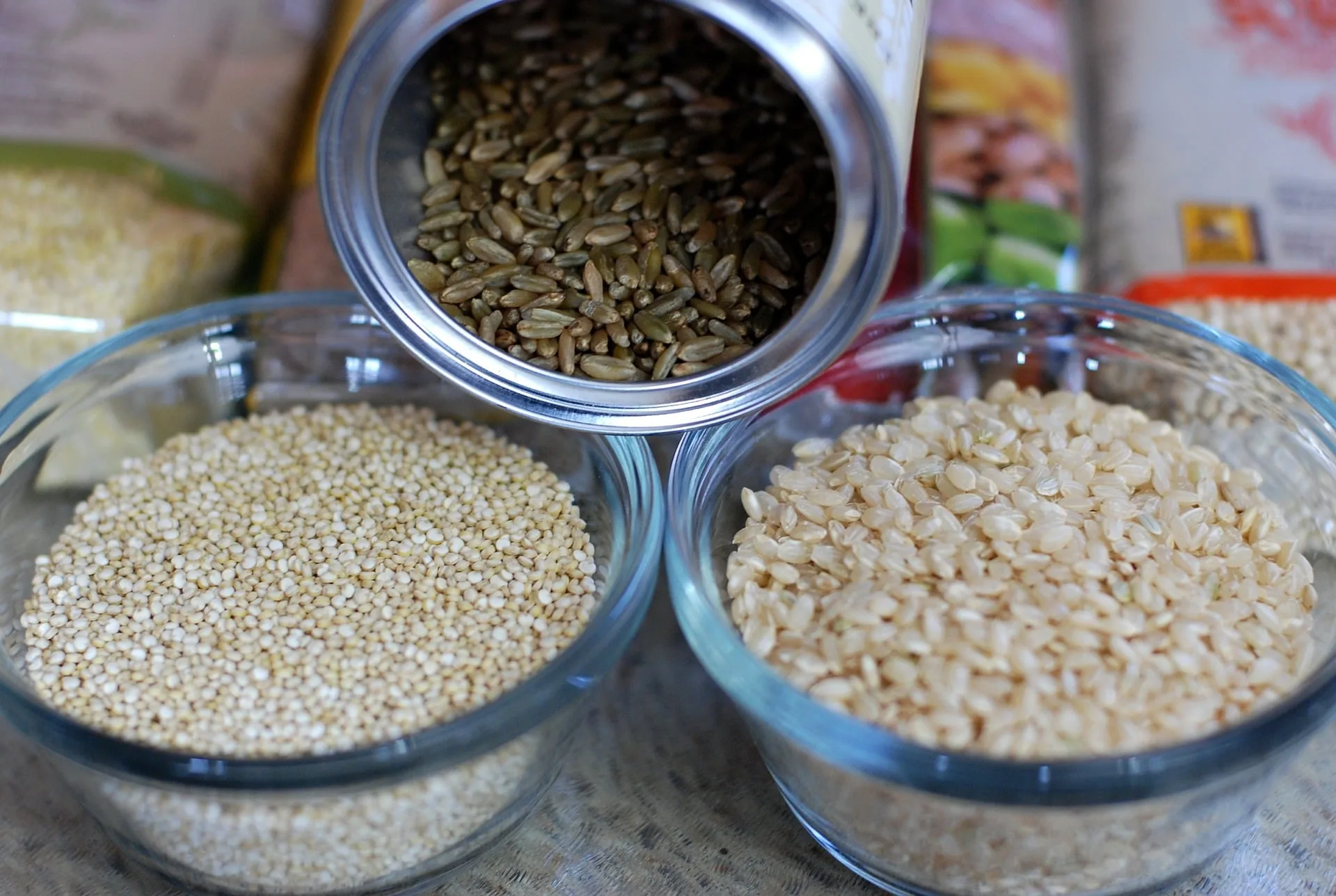 Bowls of assorted whole grains and legumes